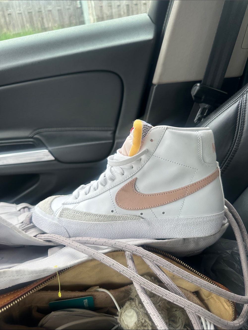 Nike Women’s High-Top Sneakers in White with Pink Swoosh